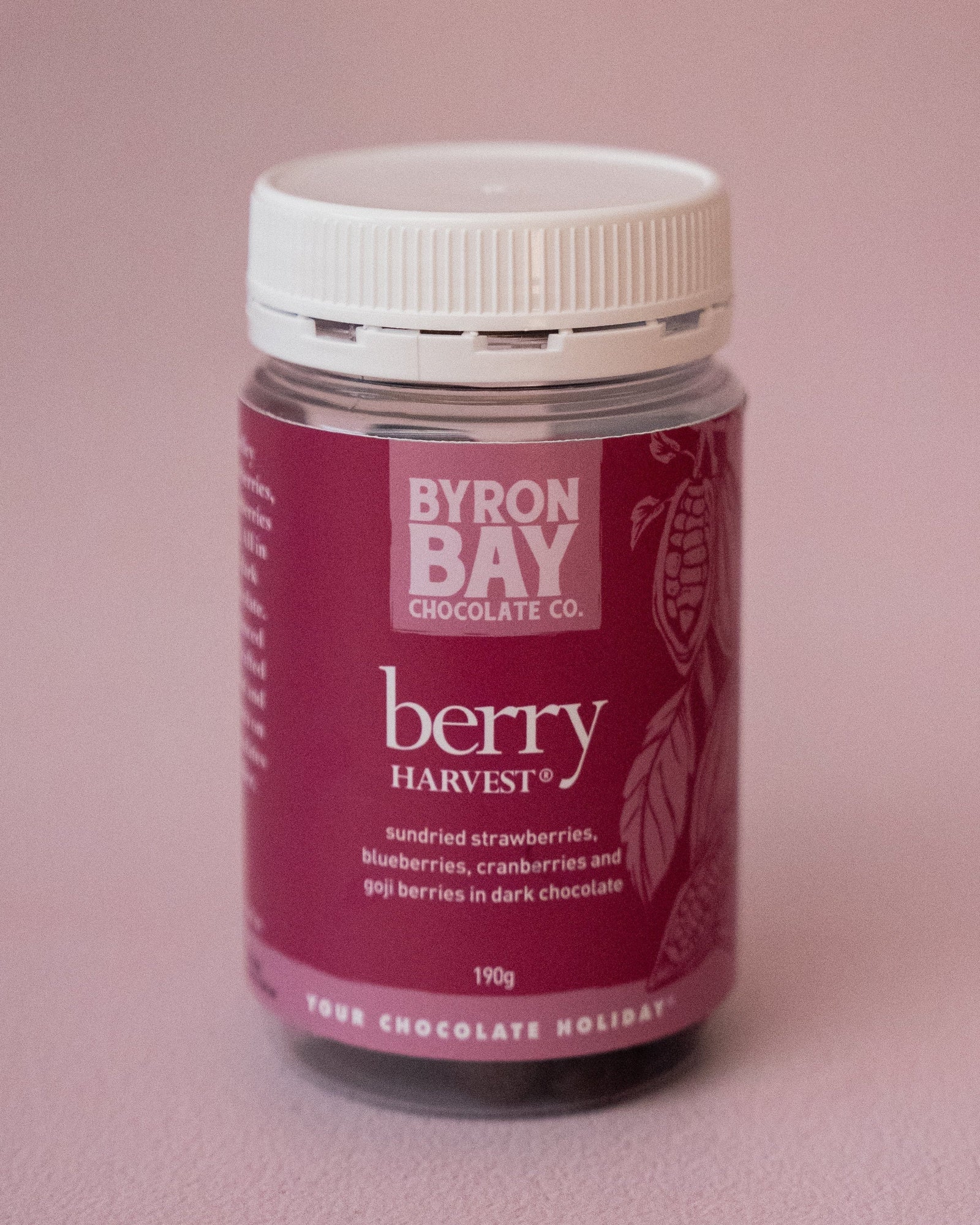 Jar of Byron Bay chocolate on a pink background