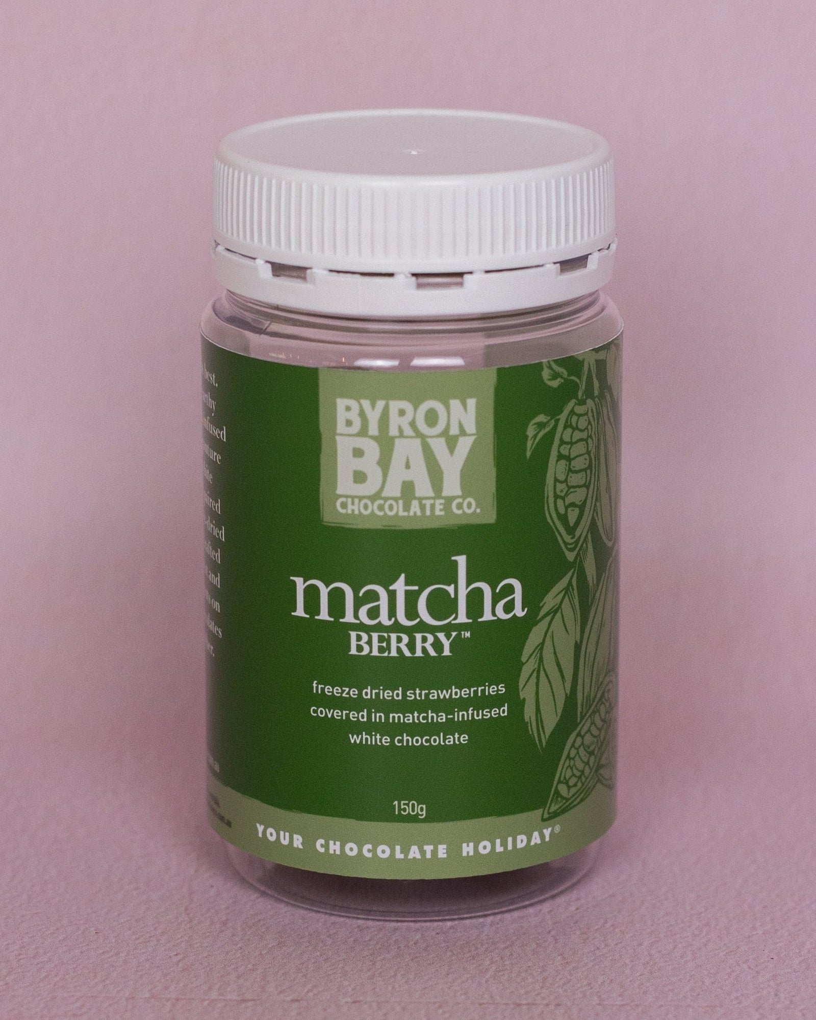 Jar of Byron Bay Chocolate Co. matcha berry on a pink background
