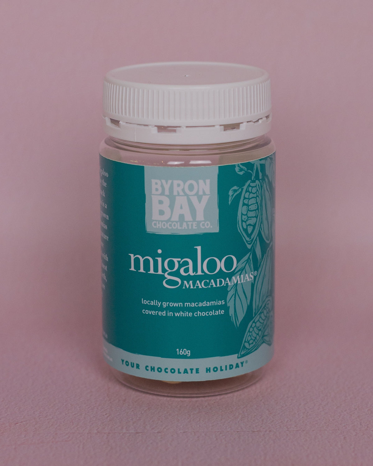 Jar of Byron Bay Macadamia nuts on a pink background