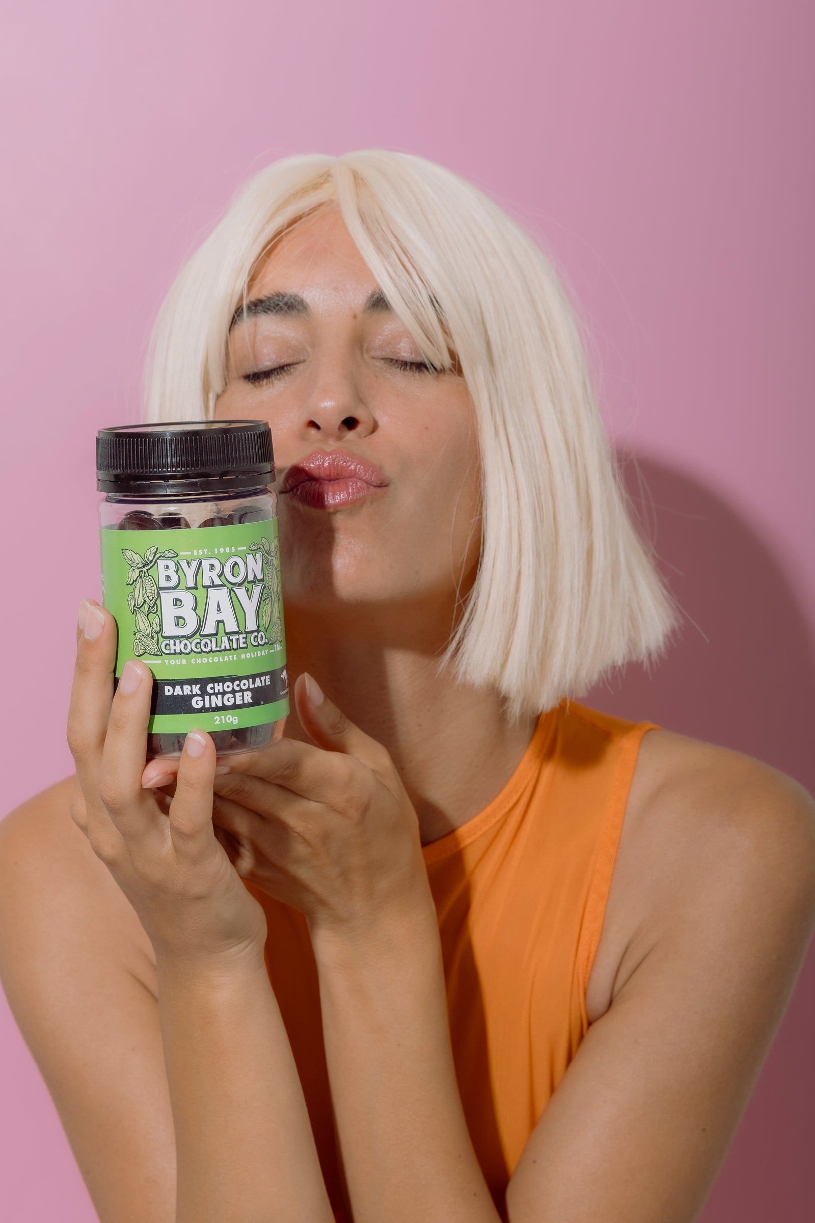 Person holding jar of chocolate and pouting 